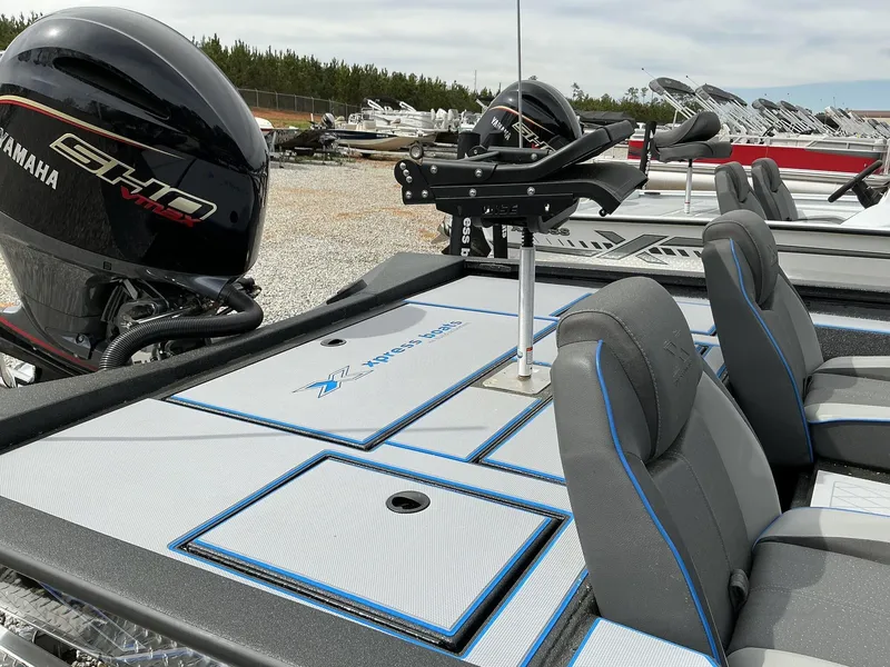 Slide: The Image of 2025 Xpress Hyper-Lift Crappie Series H20 boat with Yamaha engine, featuring sleek seating and deck design. - 3