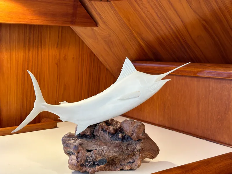 Slide: The Image of Decorative marlin sculpture on wooden base inside 1988 Buddy Davis Convertible yacht. - 36