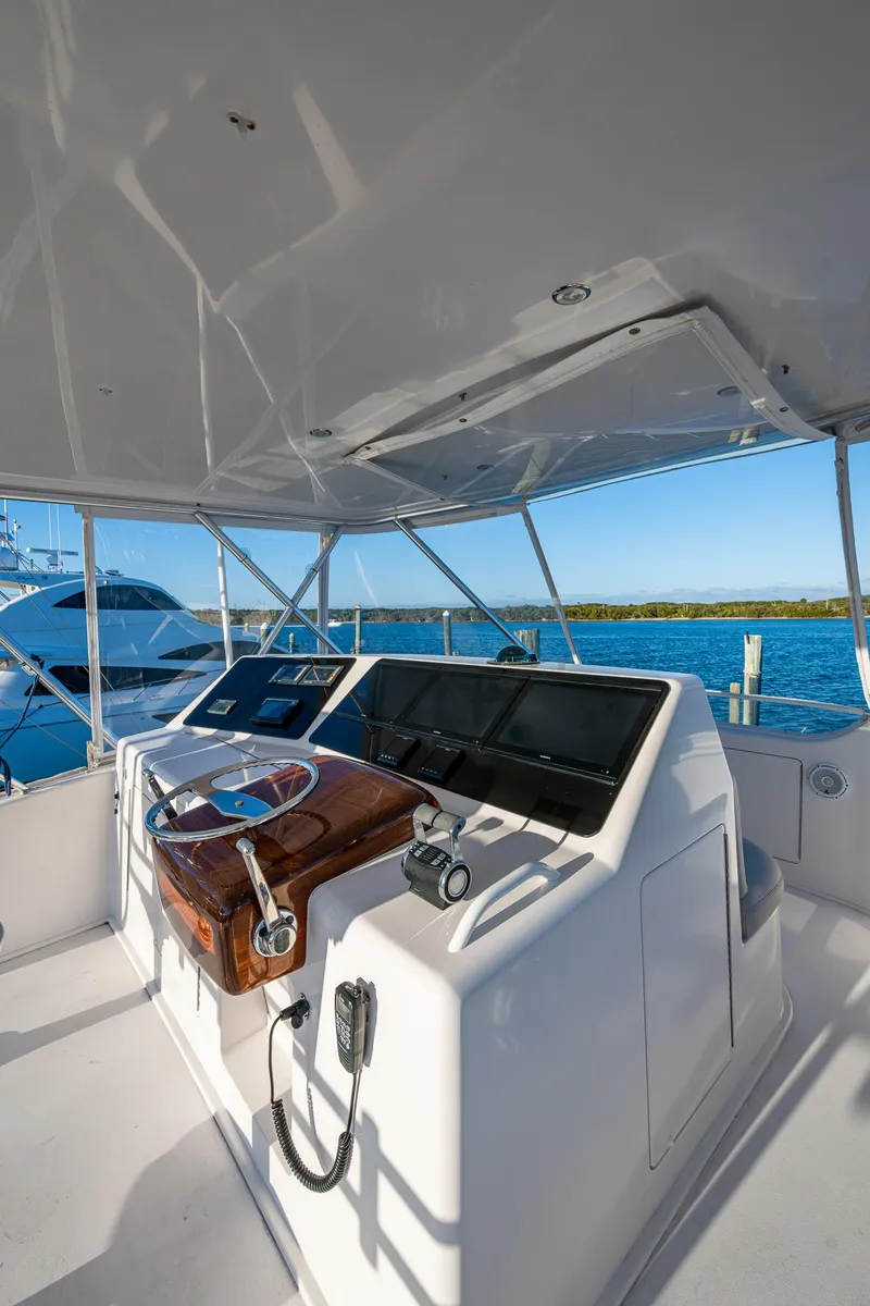 Slide: The Image of 2005 Viking 52 Convertible yacht helm with ocean view. - 27