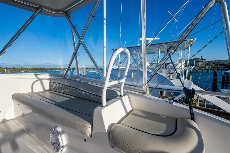 Slide: The Image of 2005 Viking 52 Convertible yacht interior with seating and ocean view. - 29