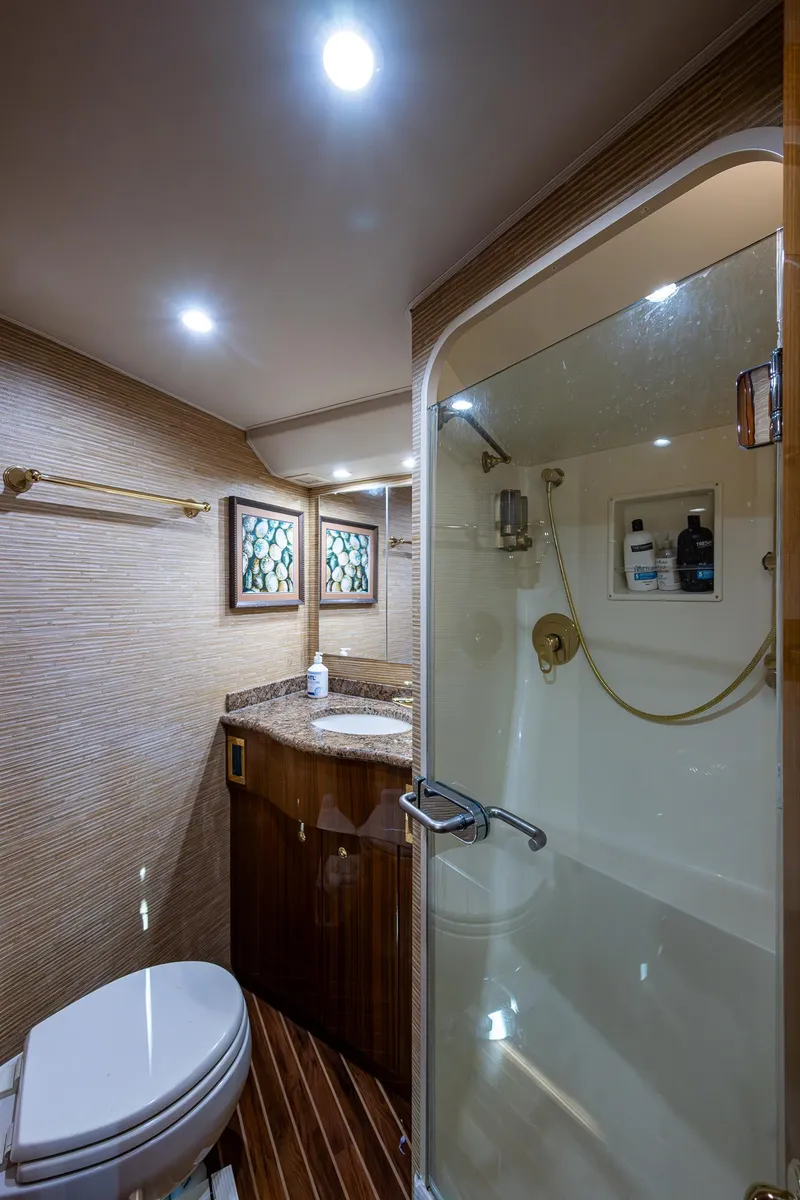 Slide: The Image of Luxurious bathroom in 2005 Viking 52 Convertible yacht with shower and elegant fixtures. - 37