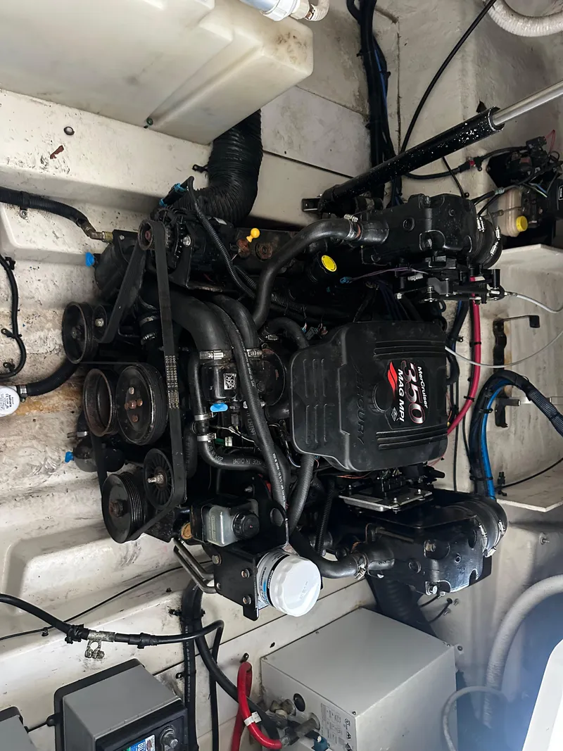 Slide: The Image of Engine compartment of a 2005 Sea Ray 260 Sundancer boat. - 10