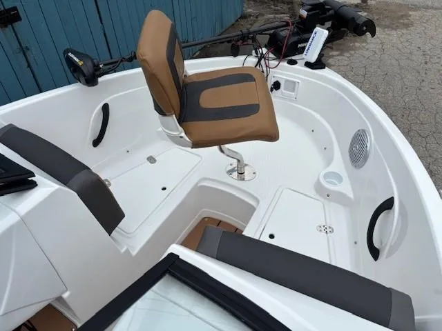 Slide: The Image of 2025 Tahoe 185 S boat interior with seating and controls, featuring modern design elements. - 6