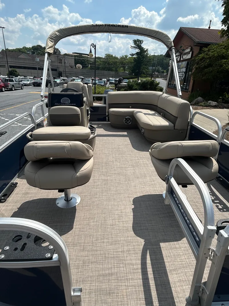 Slide: The Image of 2025 Sun Tracker Bass Buggy 16 XL Select pontoon boat with spacious seating and canopy. - 5