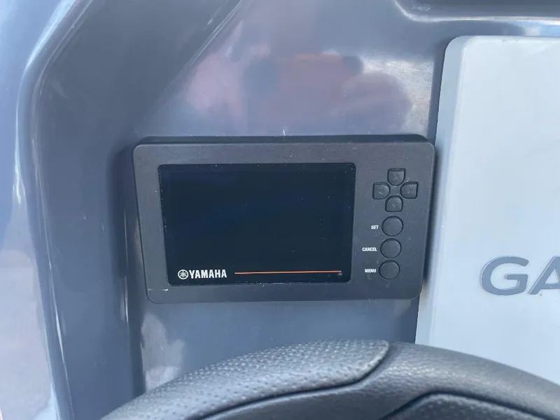 Slide: The Image of Yamaha display panel on 2020 Zodiac Open 6.5 boat dashboard. - 14