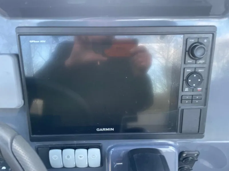 Slide: The Image of Garmin GPS display on 2020 Zodiac Open 6.5 boat dashboard. - 15