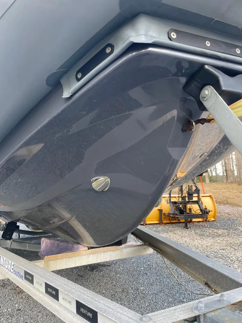 Slide: The Image of 2020 Zodiac Open 6.5 boat hull on trailer, close-up view. - 20