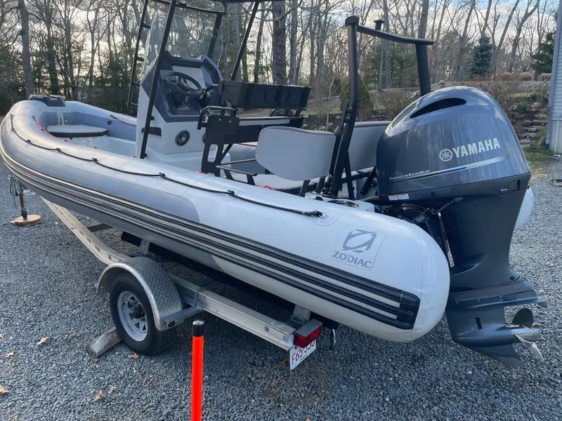 Slide: The Image of 2020 Zodiac Open 6.5 boat with Yamaha engine on a trailer. - 4