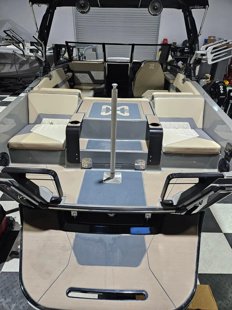 Slide: The Image of 2023 HEYDAY WAKE BOATS H20 interior with beige seating and modern design. - 2