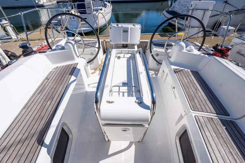 Slide: The Image of Cockpit of 2020 Jeanneau Sun Odyssey 389 sailboat with dual steering wheels. - 10