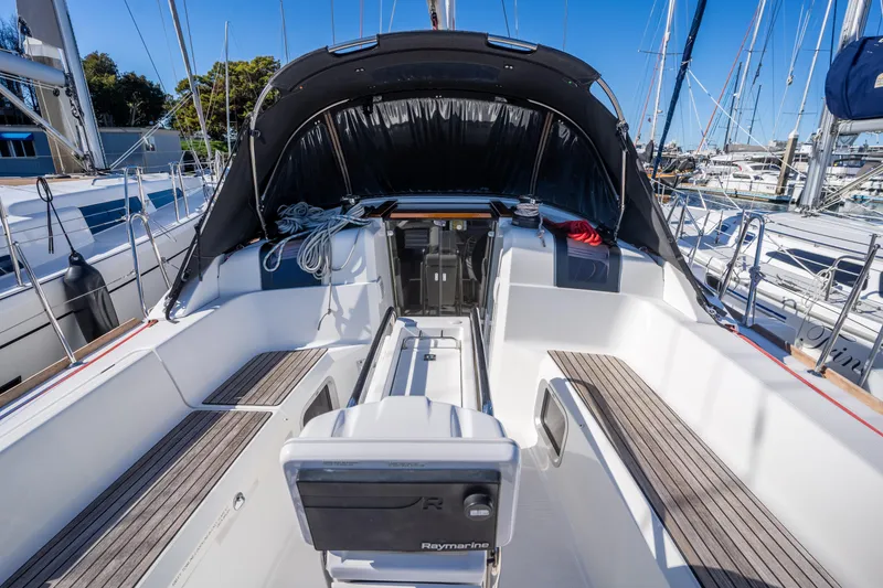 Slide: The Image of 2020 Jeanneau Sun Odyssey 389 sailboat cockpit with seating and navigation equipment. - 31