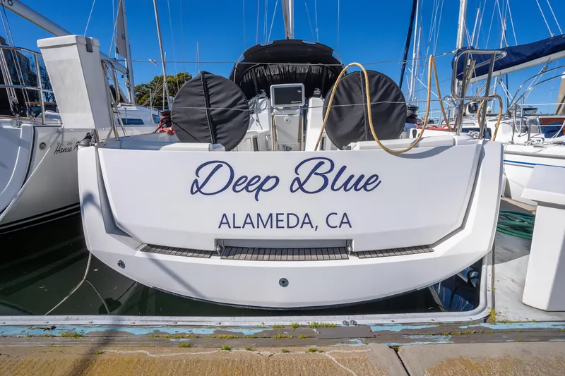 Slide: The Image of Jeanneau Sun Odyssey 389 sailboat named "Deep Blue" docked in Alameda, CA, 2020 model. - 7