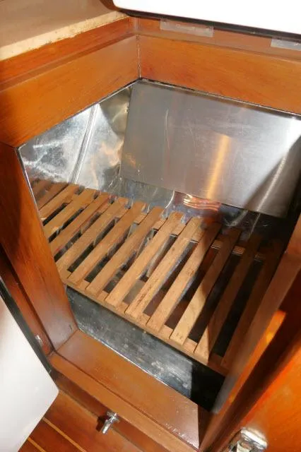 Slide: The Image of Wooden storage compartment in 2002 Tayana 460 Vancouver Pilothouse yacht interior. - 35