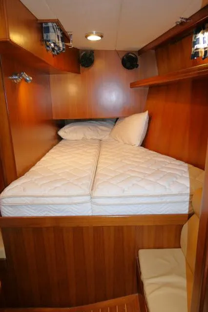 Slide: The Image of Cozy cabin interior of 2002 Tayana 460 Vancouver Pilothouse yacht with wooden finish. - 40