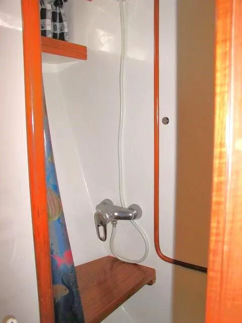 Slide: The Image of Shower area in 2002 Tayana 460 Vancouver Pilothouse yacht with wooden accents. - 49
