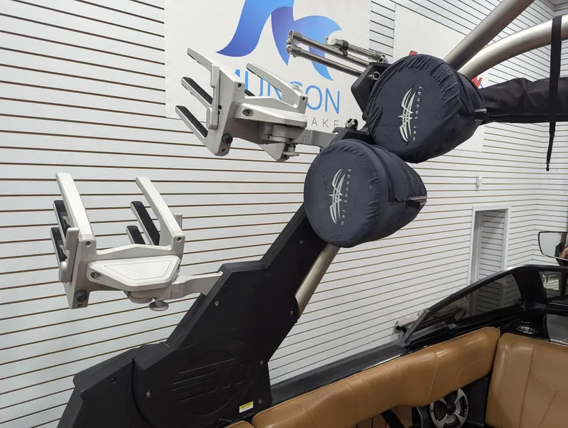 Slide: The Image of 2021 Malibu Wakesetter 24 MXZ boat with wakeboard racks and tower speakers. - 20