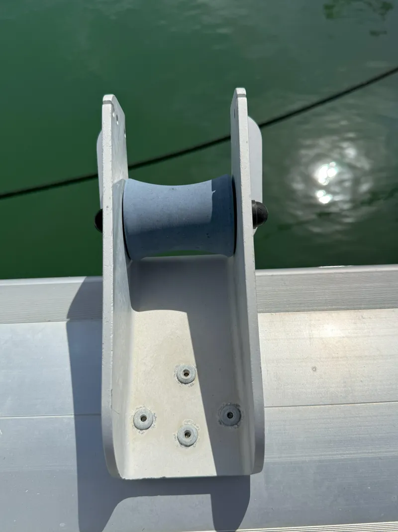 Slide: The Image of Deck fitting on 2014 Fountaine Pajot Mahe 36 Evolution catamaran, near water. - 46