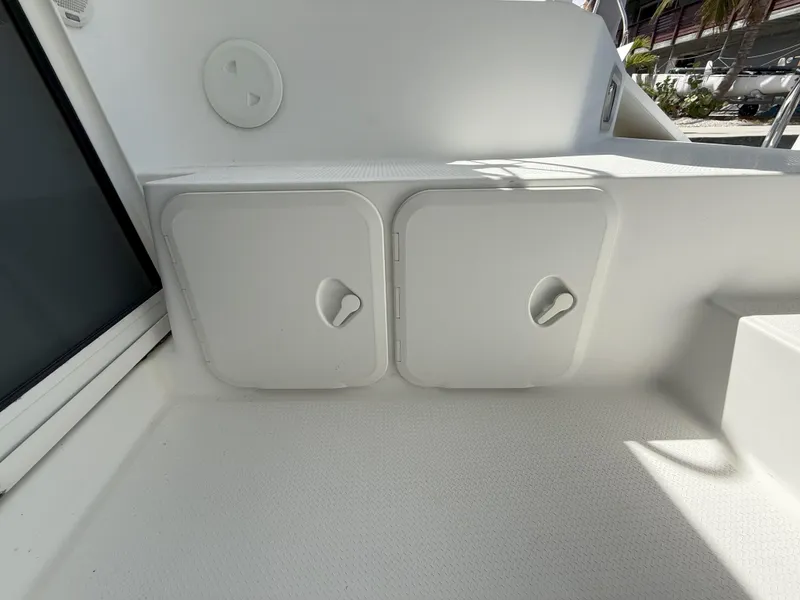 Slide: The Image of 2014 Fountaine Pajot Mahe 36 Evolution yacht storage compartments on deck. - 29