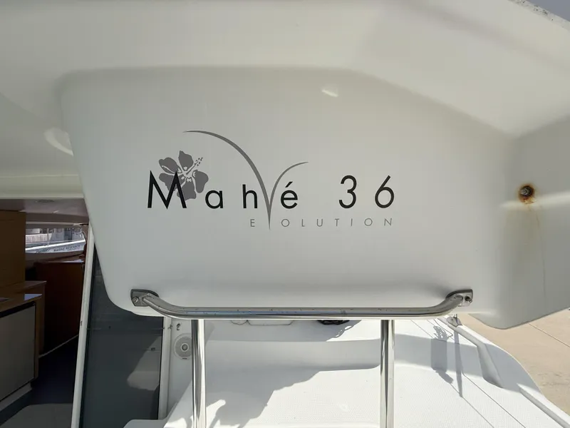 Slide: The Image of 2014 Fountaine Pajot Mahe 36 Evolution yacht, interior view with logo. - 34