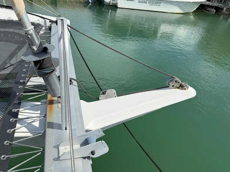 Slide: The Image of Bow of 2014 Fountaine Pajot Mahe 36 Evolution catamaran in marina. - 45