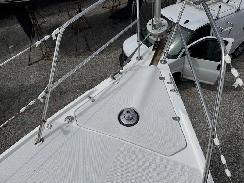 Slide: The Image of Bow of 1999 Catalina 36 Mk II sailboat with visible deck fittings and railing. - 10