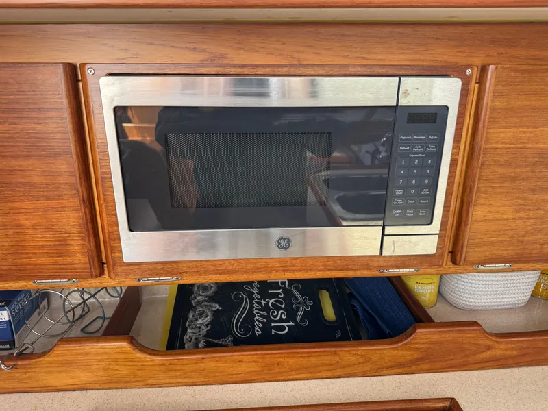 Slide: The Image of Built-in microwave in a 1999 Catalina 36 Mk II yacht kitchen. - 20