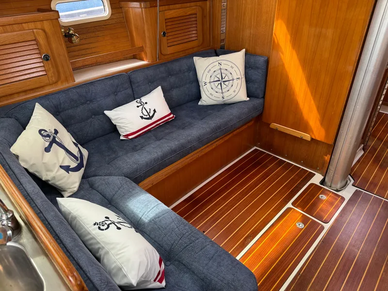 Slide: The Image of Interior of 1999 Catalina 36 Mk II sailboat with nautical-themed cushions. - 28