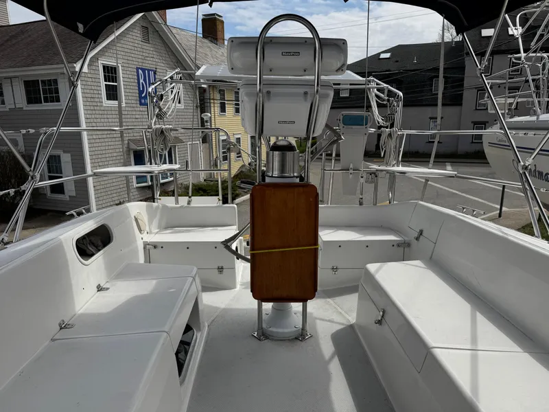 Slide: The Image of Cockpit of 1999 Catalina 36 Mk II sailboat with steering wheel and seating. - 5