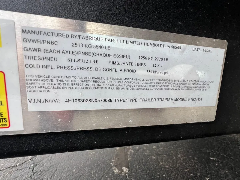 Slide: The Image of Starcraft SLS 5 trailer label with specifications and VIN, manufactured in 2022. - 10