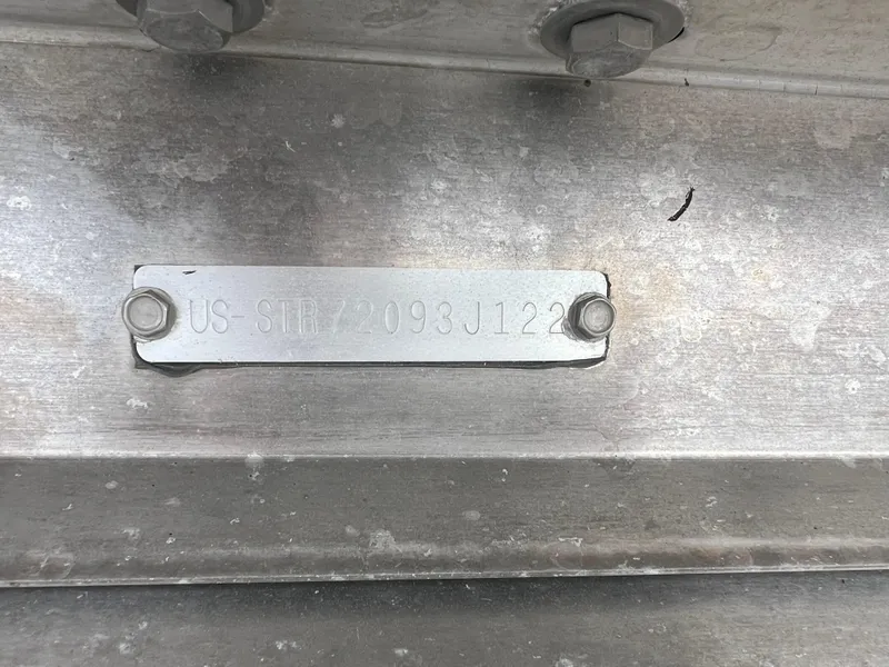 Slide: The Image of 2022 Starcraft SLS 5 metal identification plate with engraved serial number. - 11