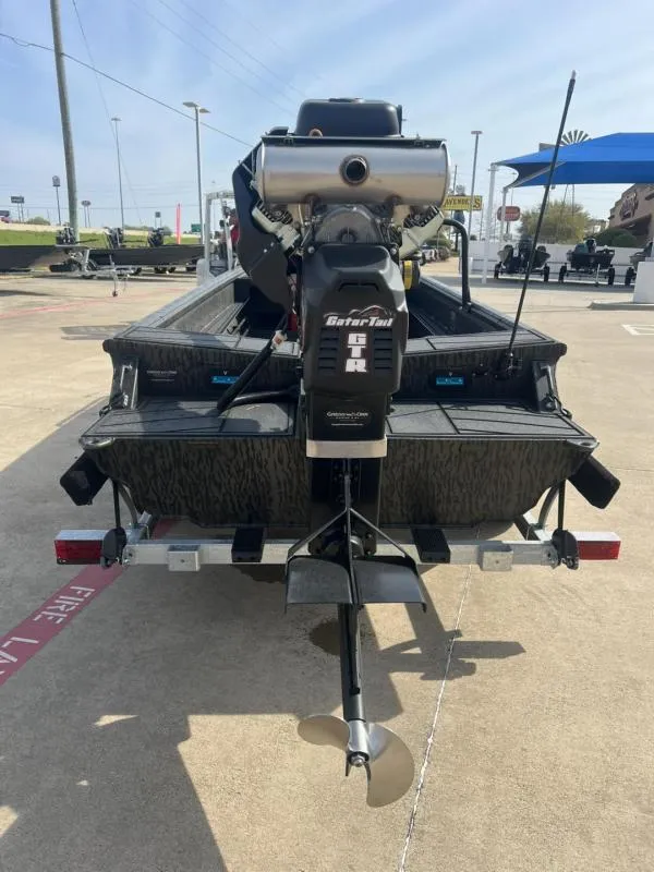 Slide: The Image of 2025 Gator Tail 17/50 Savage Series boat with powerful outboard motor, rear view. - 4