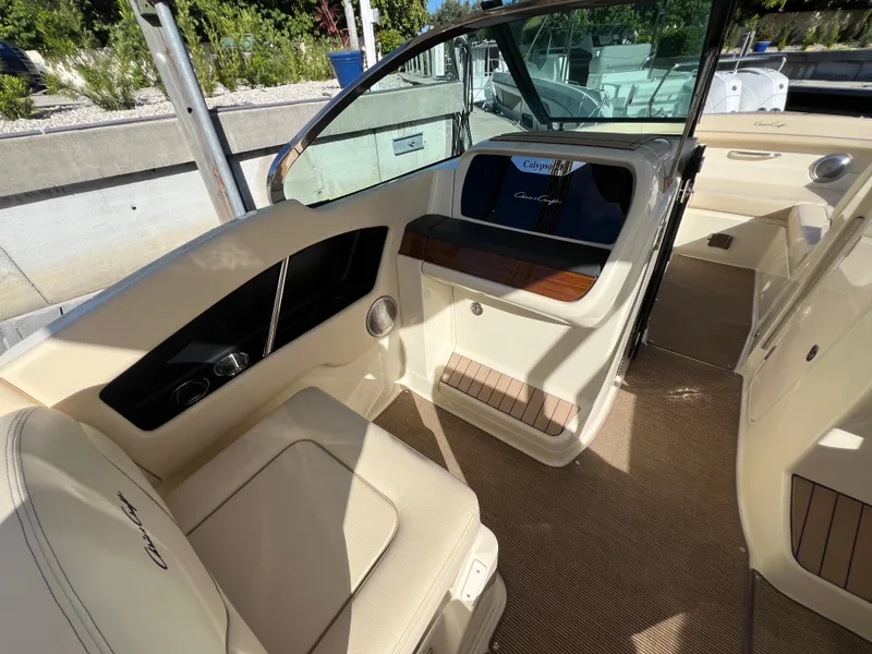 Slide: The Image of 2025 Chris-Craft Calypso 28 interior with elegant seating and modern design. - 16