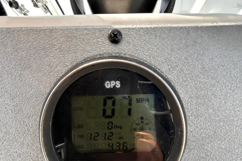 Slide: The Image of GPS speedometer showing 0.7 MPH on a 2006 Clearwater 2300 WA boat. - 12