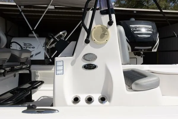 Slide: The Image of 2020 Blue Wave Pure Bay boat interior with steering console and seating. - 17