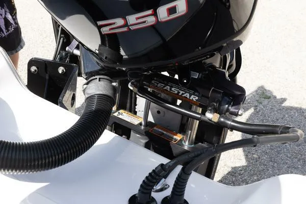Slide: The Image of Outboard motor on a 2020 Blue Wave Pure Bay boat with SeaStar hydraulic steering. - 24
