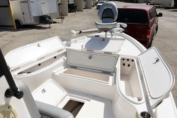 Slide: The Image of 2020 Blue Wave Pure Bay boat interior with open storage compartments and seating. - 33