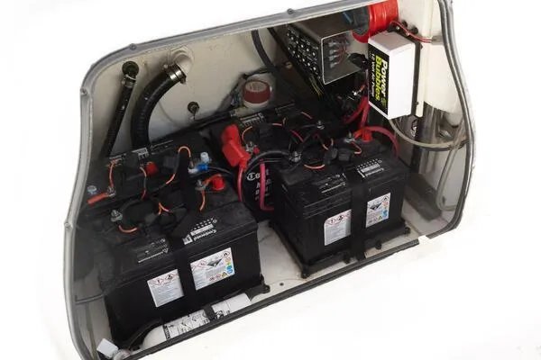 Slide: The Image of 2020 Blue Wave Pure Bay boat battery compartment with wiring and components. - 34