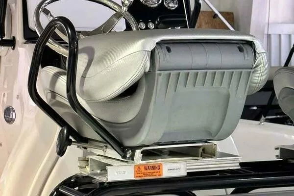 Slide: The Image of 2020 Blue Wave Pure Bay boat seat with steering wheel and warning label. - 40