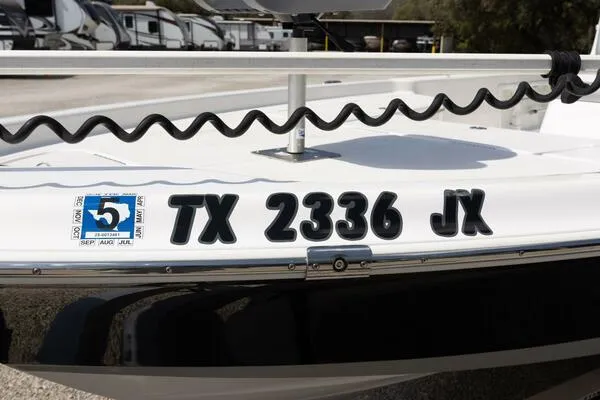 Slide: The Image of 2020 Blue Wave Pure Bay boat with registration TX 2336 JX displayed. - 41