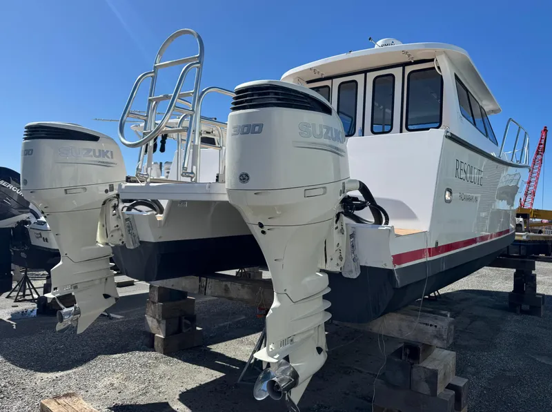 Slide: The Image of 2020 Cape Powercat 3500 PH boat with dual Suzuki outboard engines on display. - 10