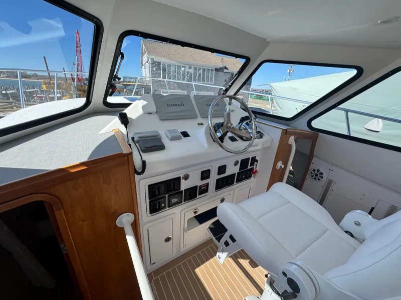 Slide: The Image of Interior of 2020 Cape Powercat 3500 PH boat with modern helm and seating. - 22