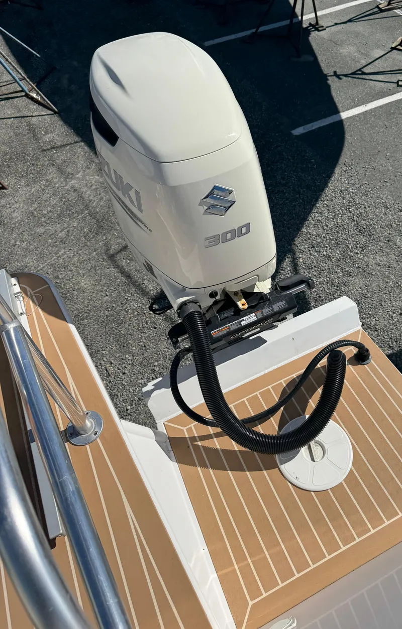 Slide: The Image of Outboard motor on 2020 Cape Powercat 3500 PH boat, featuring Suzuki 200 engine. - 27