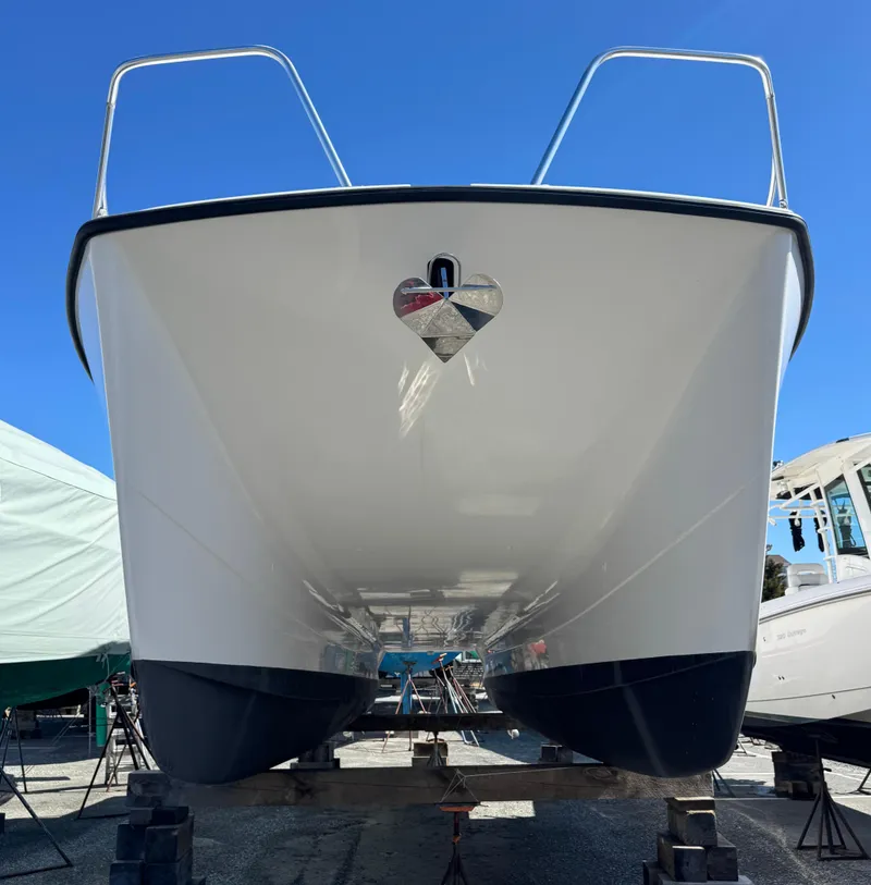 Slide: The Image of 2020 Cape Powercat 3500 PH boat on display, showcasing sleek design and sturdy build. - 9