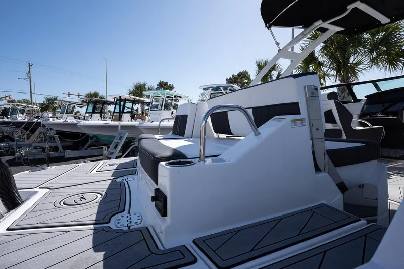 Slide: The Image of 2025 Monterey M-65 boat interior with sleek seating and modern design. - 11