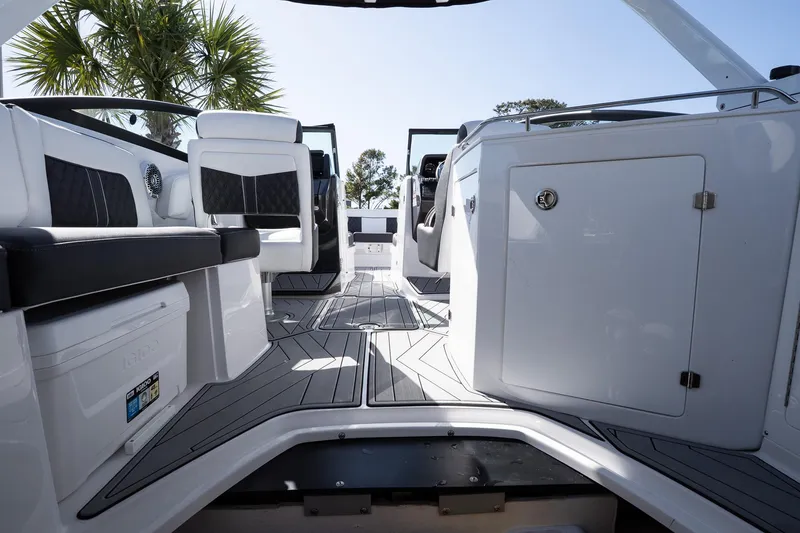 Slide: The Image of 2025 Monterey M-65 boat interior with sleek seating and modern design. - 33