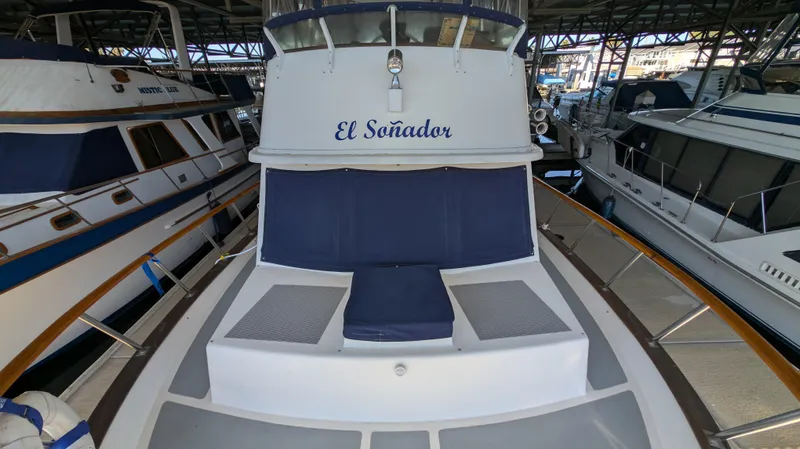 Slide: The Image of 1982 Monk 36 boat named "El Soñador" docked in a marina. - 8