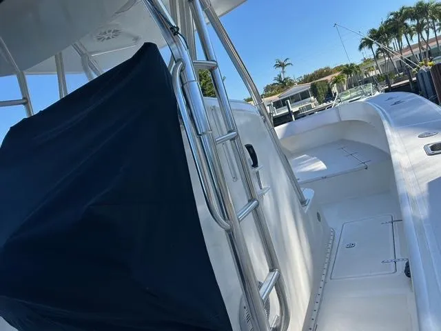 Slide: The Image of 2002 Venture 34 Center Console boat with sleek design and stainless steel features. - 24