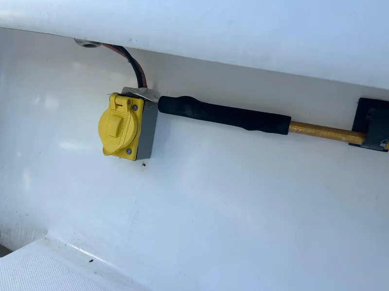 Slide: The Image of Yellow electrical outlet on 2002 Venture 34 Center Console boat. - 39
