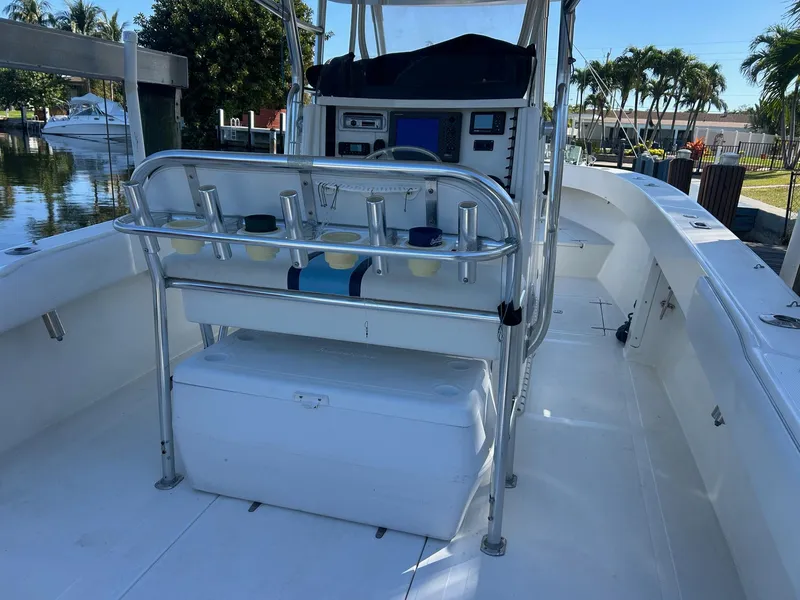 Slide: The Image of 2002 Venture 34 Center Console boat with spacious deck and modern controls. - 4