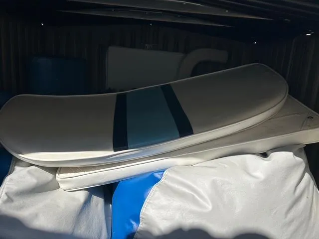 Slide: The Image of Cushions stored in a 2002 Venture 34 Center Console boat compartment. - 42